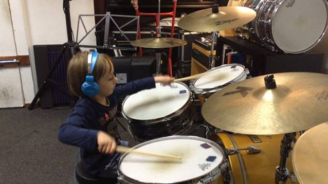 Here's one of my students, Amos, smashing out some We Will Rock You. Not bad...